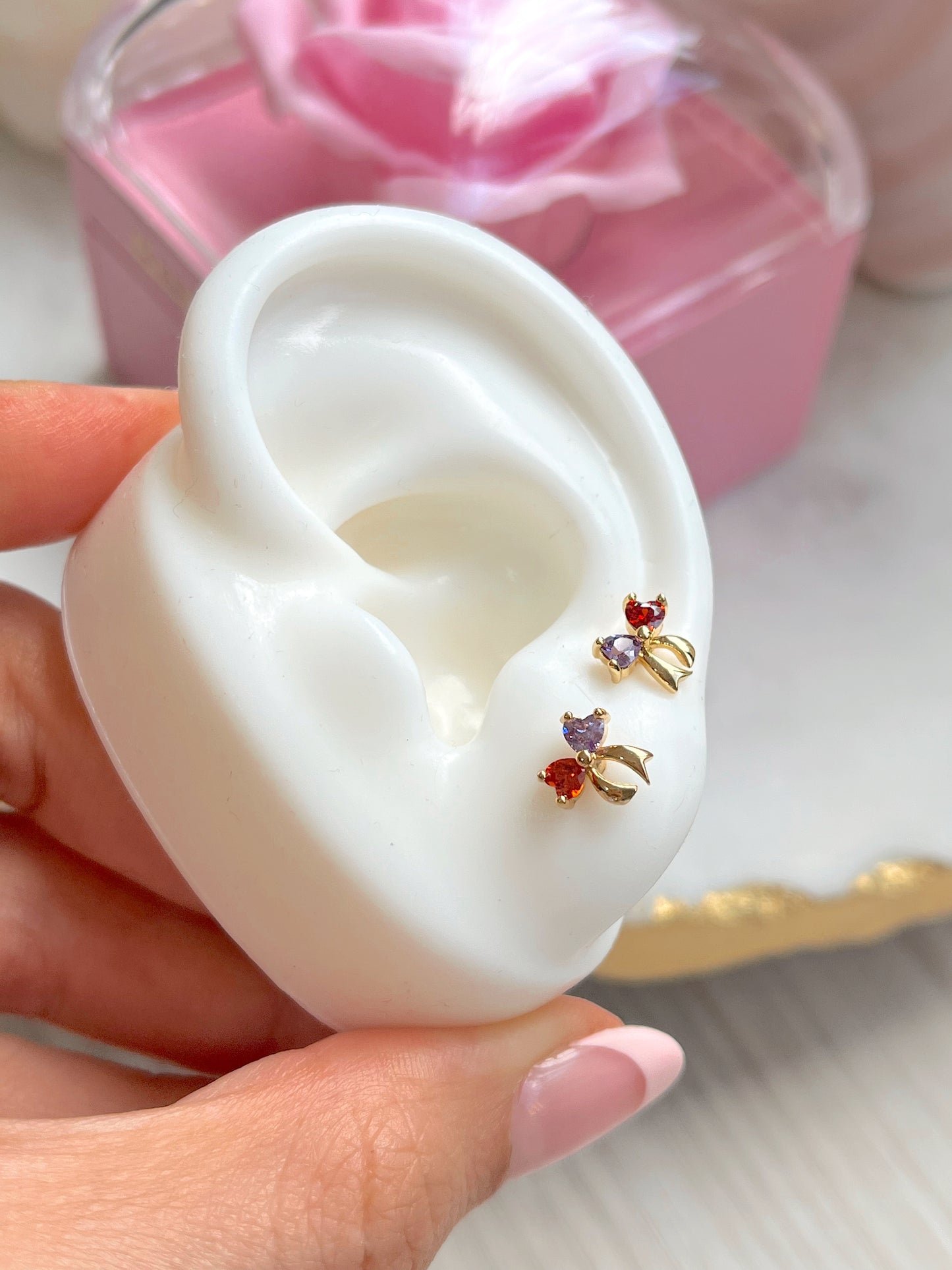 Par de aretes ortopédicos cute piercings