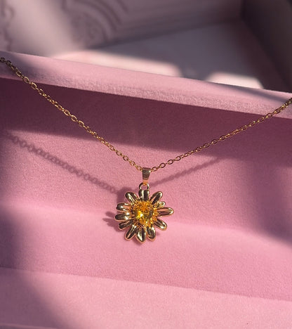 Cadena de girasol y cofre disney